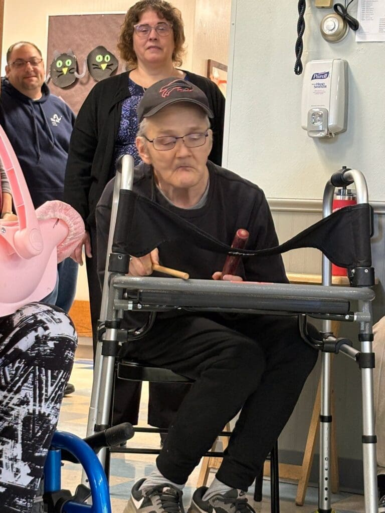 man playing the percussion sticks